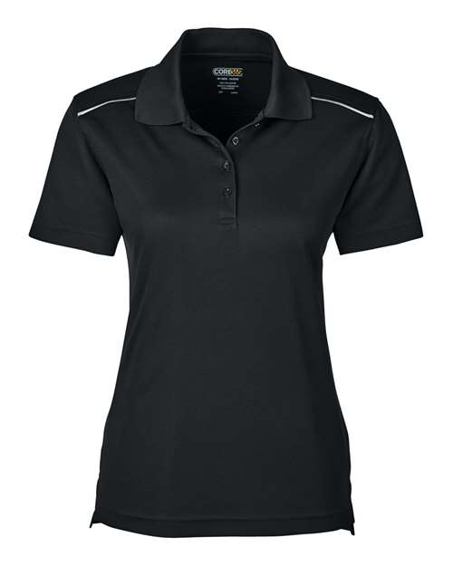 Women’s Radiant Performance Piqué Polo with Reflective Piping — Black (front) Women’s Radiant Performance Piqué Polo With Reflective Piping